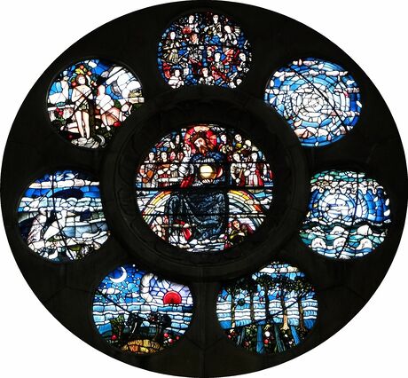 Rose window; seven circular images surround an eighth, giving an idea of what the Brick Moon's interior looks like